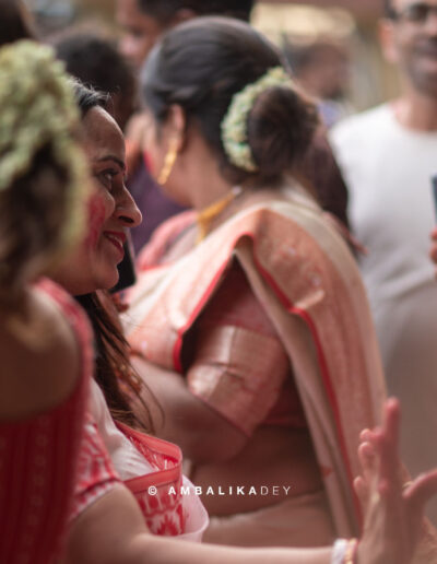 Participants in traditional attire at a Durga Puja celebration in Kolkata